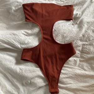 Revolve Darcey Cut Out Bodysuit in Rust